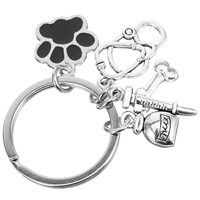 Veterinary Keychain Cute Dog Paw Print Zinc Alloy Bag Charm Keychains Women Backpack Aesthetic Novelty Purse Charms Keyring