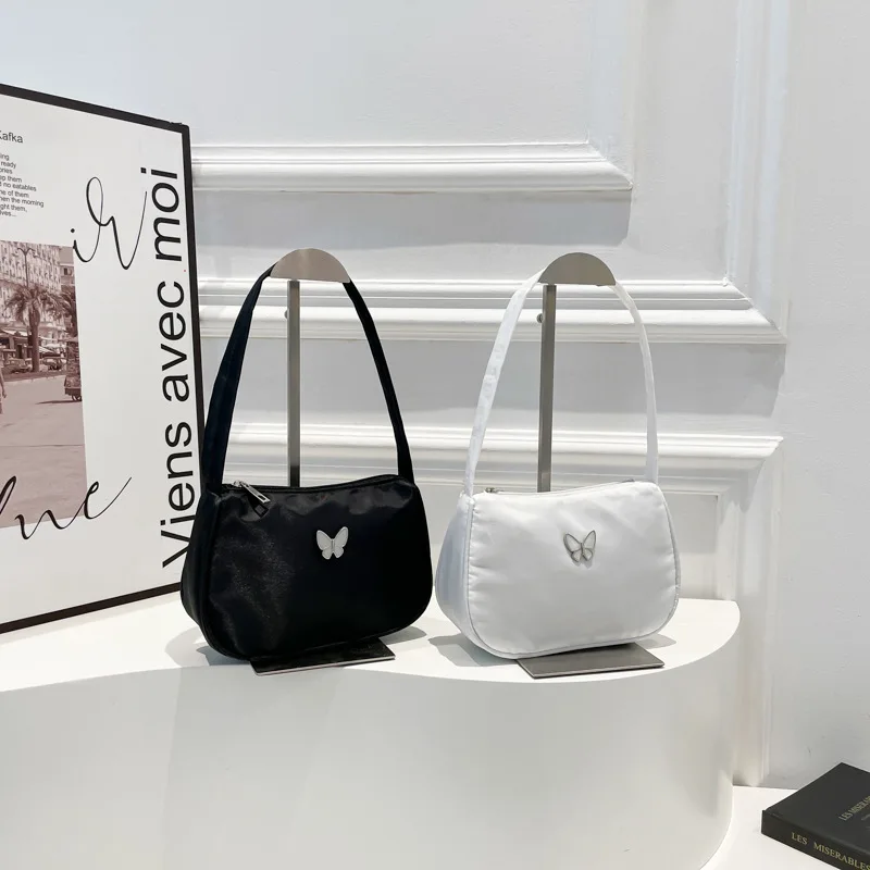 

Нишевые дизайнерские текстурные сумки для женщин, новинка 2025 года, простые повседневные одинаковые повседневные сумки на одно плечо, мятая сумка подмышками