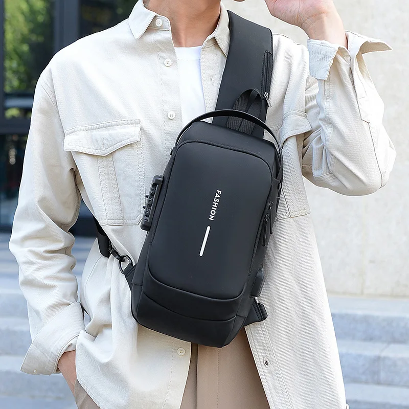 Bolso de pecho para hombre, bandolera impermeable con USB, antirrobo, de viaje, a la moda, novedad