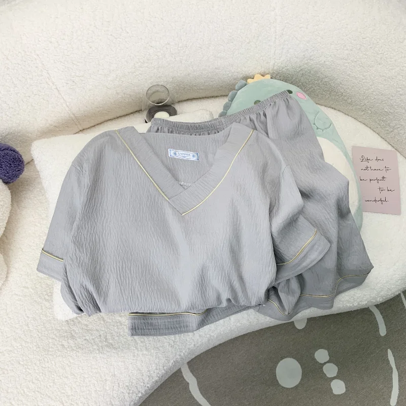 Novedad de verano 2025, pijamas cortos informales lisos para hombre, conjunto de pijamas sencillos de moda con cuello en V fino de estilo coreano para hombre