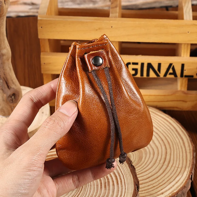 

New Cowhide Leather Coin Purse Mini Retractable String Wallet Vintage Handmade Simple Storage Bag Key Headphone Coin Bag