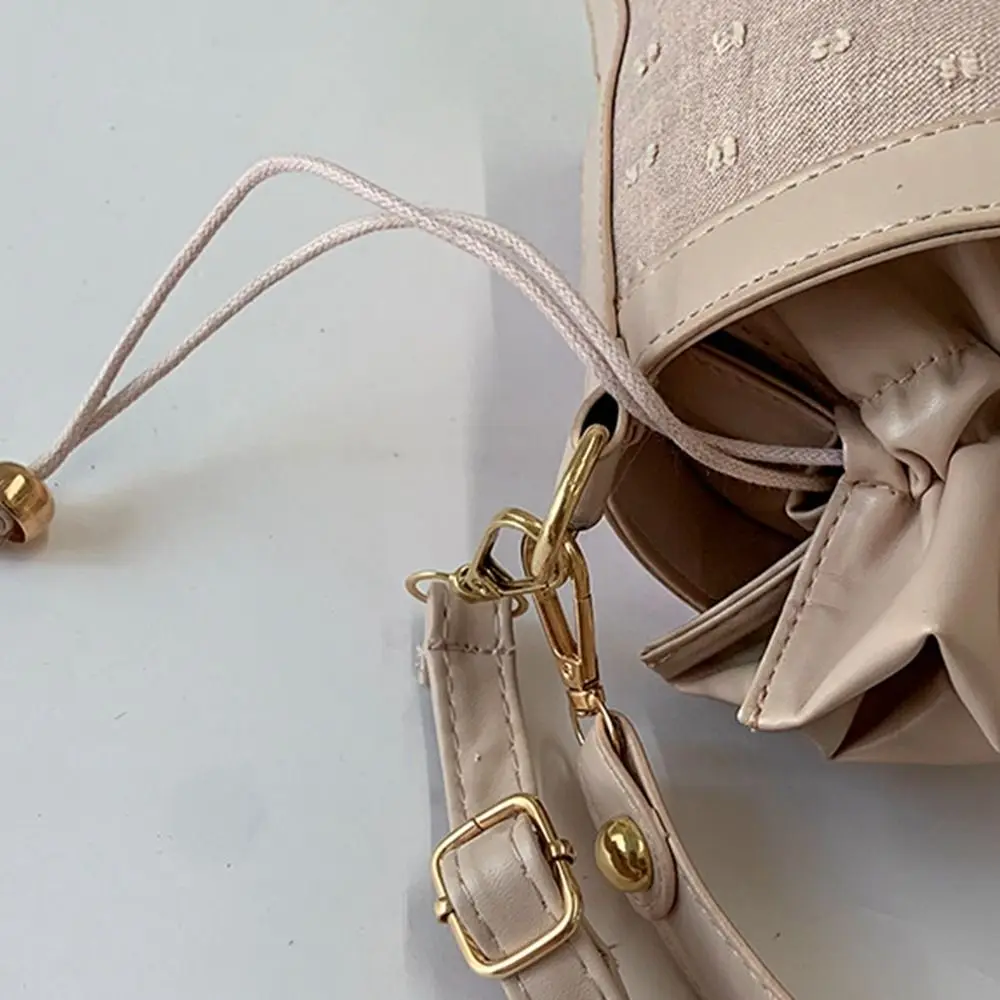 حقيبة دلو برباط على الطراز الكوري غير رسمية حقيبة يد أسطوانية من البولي يوريثان حقيبة كتف محمولة بلون سلة خضراوات حقيبة للفتيات