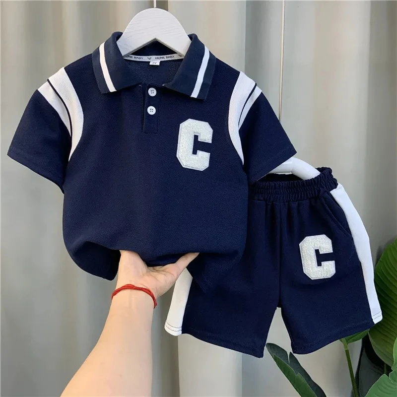 Conjunto de ropa para niños, camiseta Polo y pantalones cortos para bebés, conjunto de dos piezas de manga corta, verano, 2023