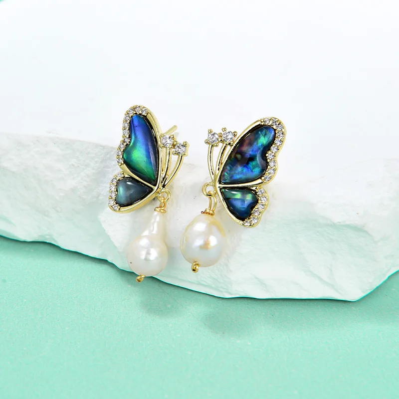 

Natural pearl Butterfly dancing pearl earrings delicate fashion everything with niche personality color dazzling starry sky