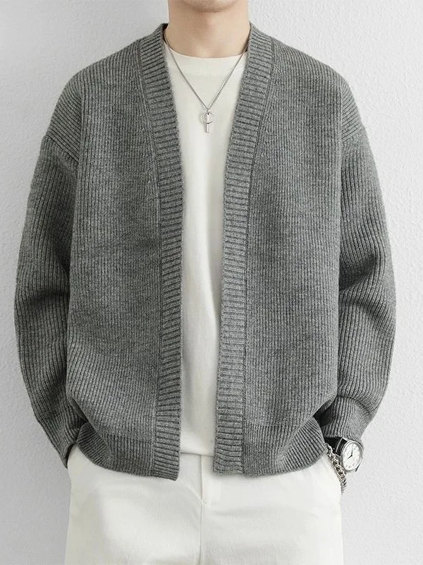 

Новый осенне-зимний мужской кардиган из трикотажа однотонного цвета: универсальный повседневный свитер-жакет, модный и стильный.