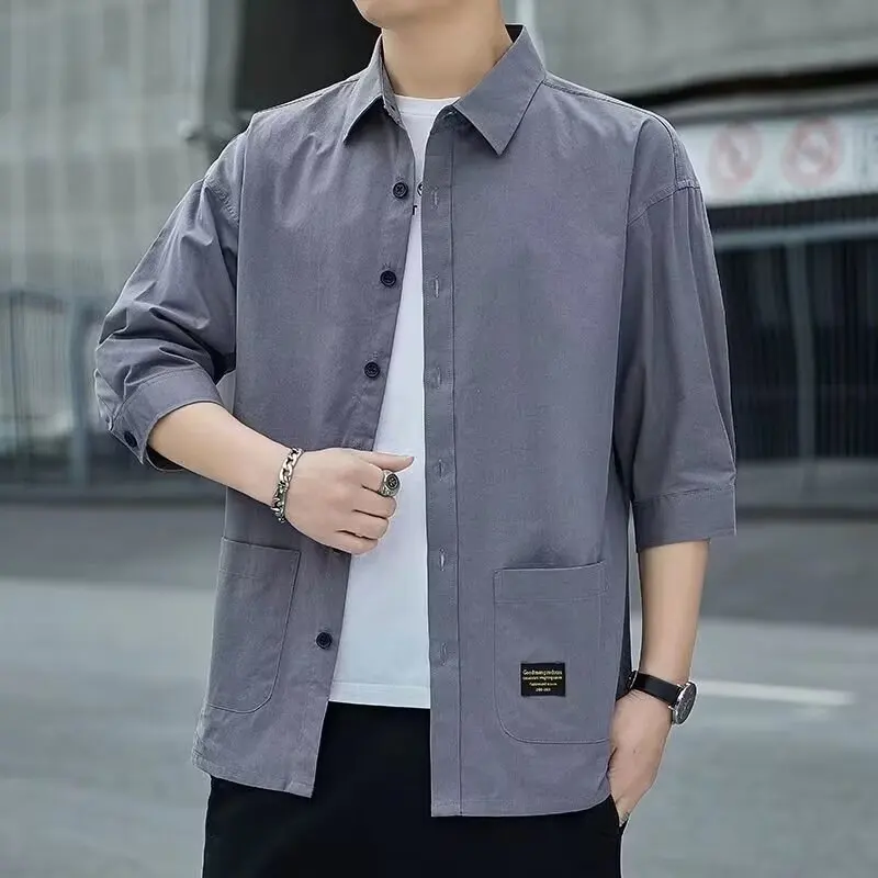 

Свободная мужская летняя модная рабочая одежда Seven-Quarter Sve Повседневная верхняя одежда большого размера с острым воротником на пуговицах Полиэстер...