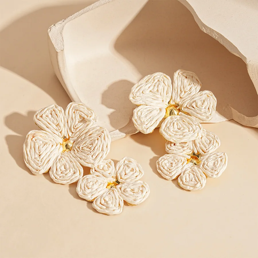 Summer seaside vacation wind raffia flower steel needle earrings fresh personality niche temperament high-end earrings
