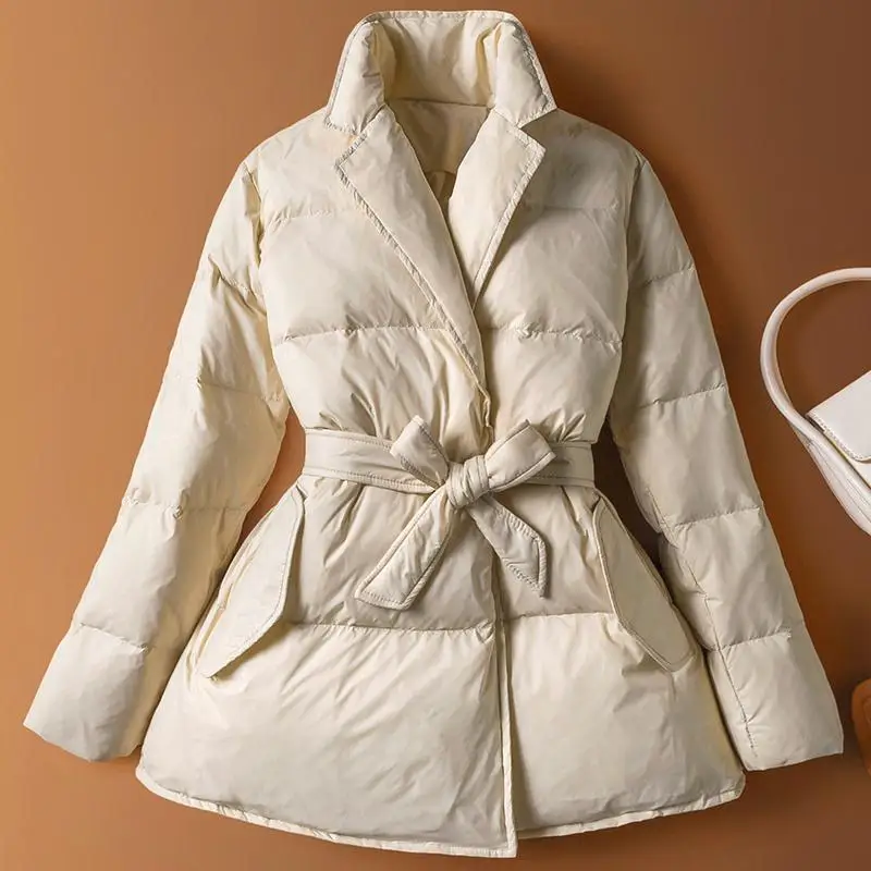 

Женский пуховик из белого утиного пуха, свободный крой, утепленный, большие размеры, с поясом на талии, длинное пальто, стильный деловой воротник, средней длины