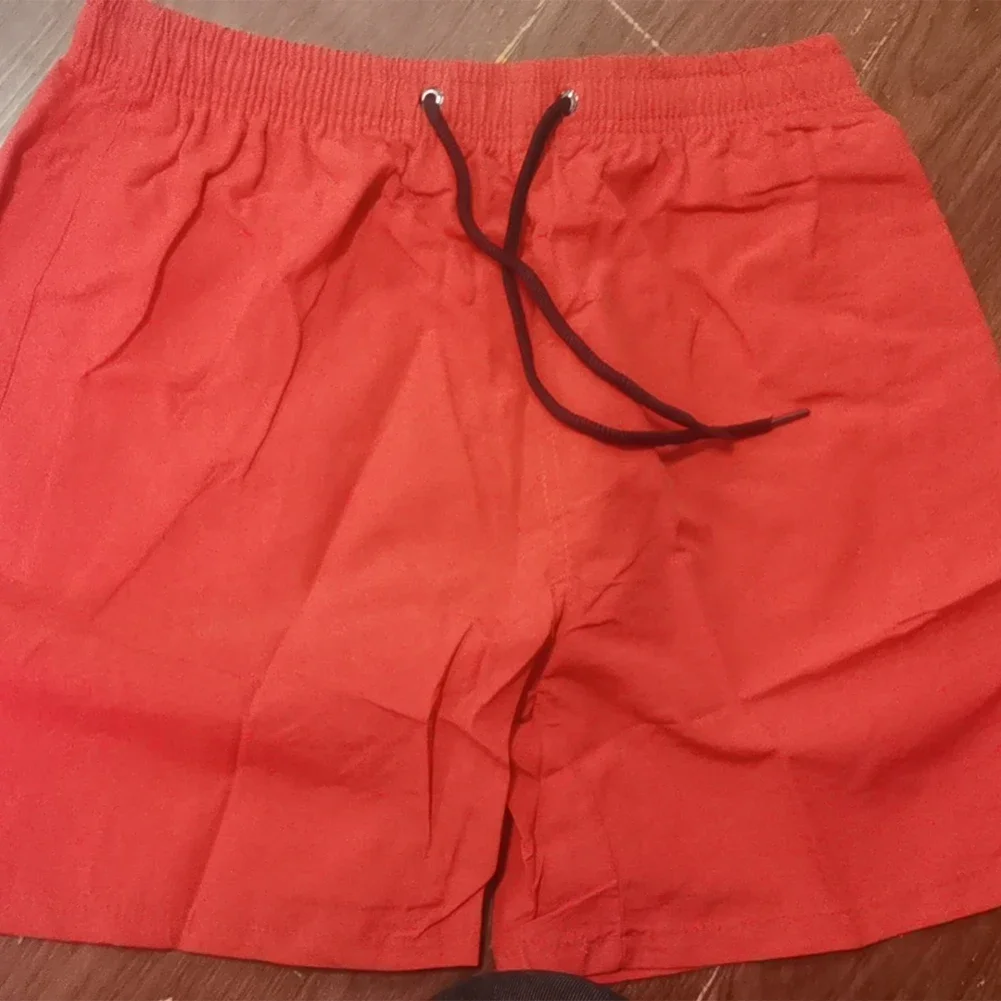 ملابس شاطئ كاجوال شورت للياقة البدنية خفيف الوزن ملابس رياضية خفيفة الوزن وقابلة للتنفس تصميم فضفاض مناسب طراز قصير الطول