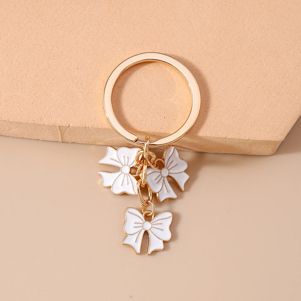 Aihua Metall Bunter Schleifen-Schlüsselanhänger Romantische Sommer-Party Mädchen Handtaschen-Anhänger Schlüsselring Modeschmuck Geschenke – Detail 5