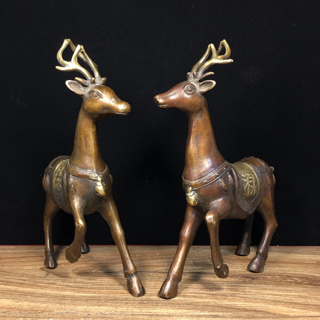 A pair of bronze statues of pure copper, gilded with gold, depicting the fortune, plum blossom, and deer Length 15.5cm, width 5c