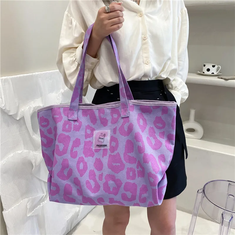 Bolso de mano de lona con patrón de leopardo para mujer, bolso de hombro informal de estilo coreano para estudiantes, gran capacidad, gran oferta