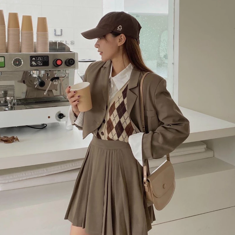 Sweter dziergany kamizelka kobiety Retro na wszystkie mecze jednorzędowe różnokolorowe kamizelki w stylu Preppy Chic Kawaii swetry bez rękawów
