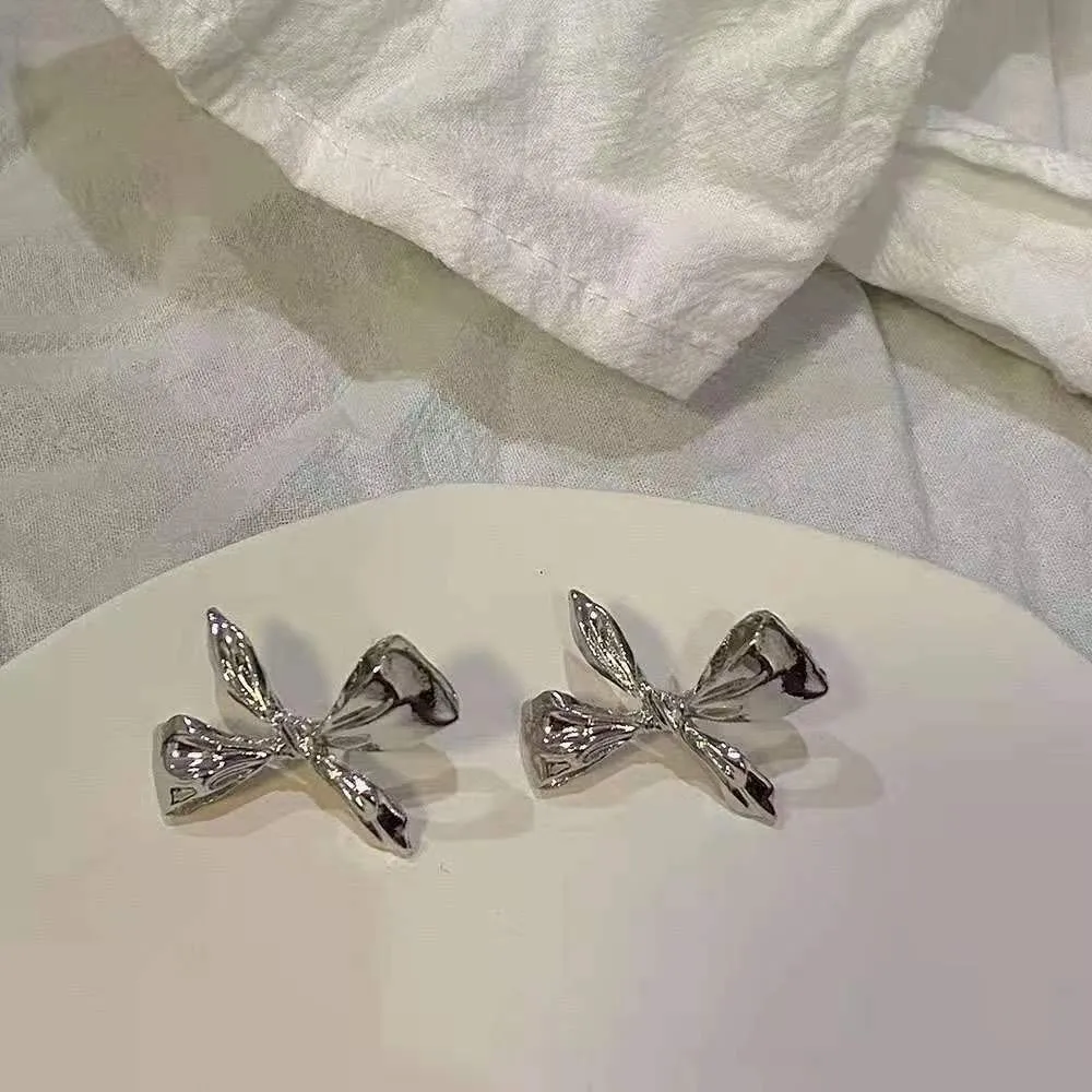 Retro Bow Stud Earrings for Women Silver Color Fold Twist Metal Earrings Trendy Geometry Party Cute Jewelry Girls Gift