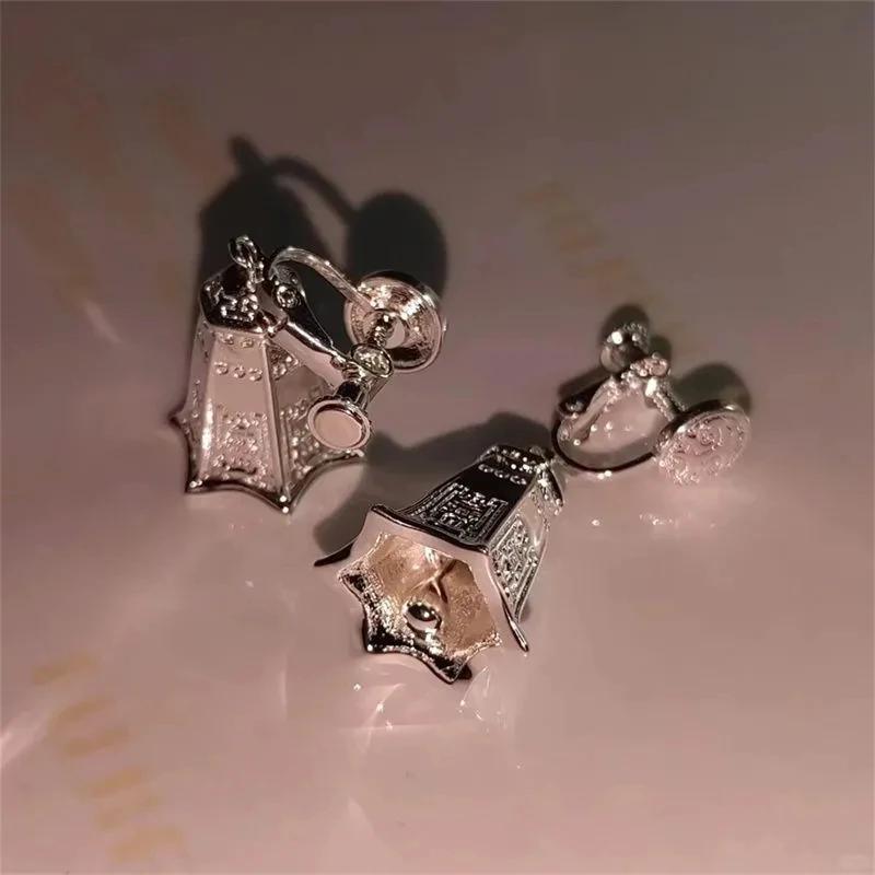 It will make a sound as you walk Hexagonal copper bell earrings ethnic style delicate ear clip hand made niche earring jewelry