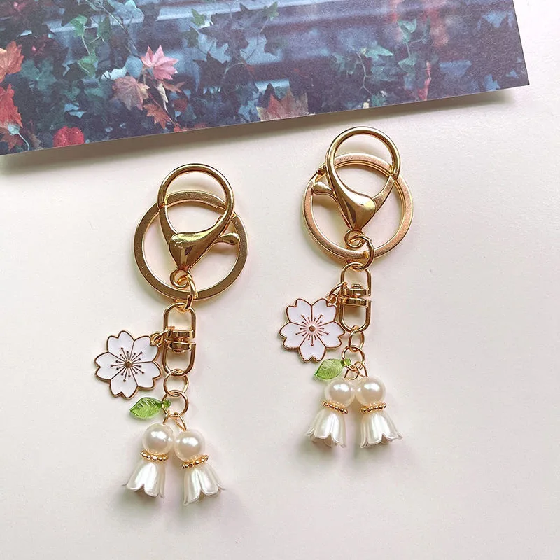 

New Style Of The New Style Of The Roman Lily Of The Valley Cherry Blossom Car Keychain Simple And Compact Pendant Exquisite Gift