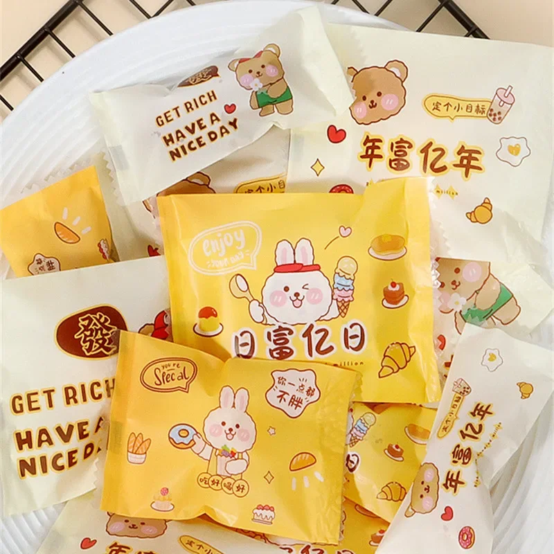 

100Pcs Cartoon Rabbit Bear Printed Candy Nougat Baking Cookies Biscuit Machine Sealed Party Gift Packaging Bags