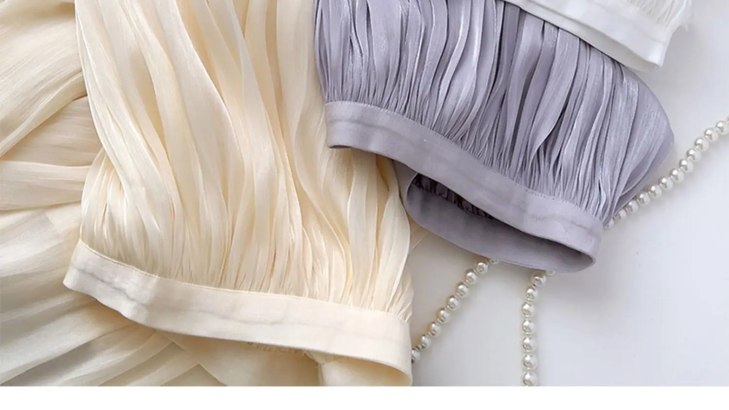 2026 Frühjahr/Sommer Neuer Glänzender A-Linien-Rock für Damen, Einfarbig, Hohe Taille, Französischer Pariser Stil, Eleganter Asymmetrischer Rock – Detail 4