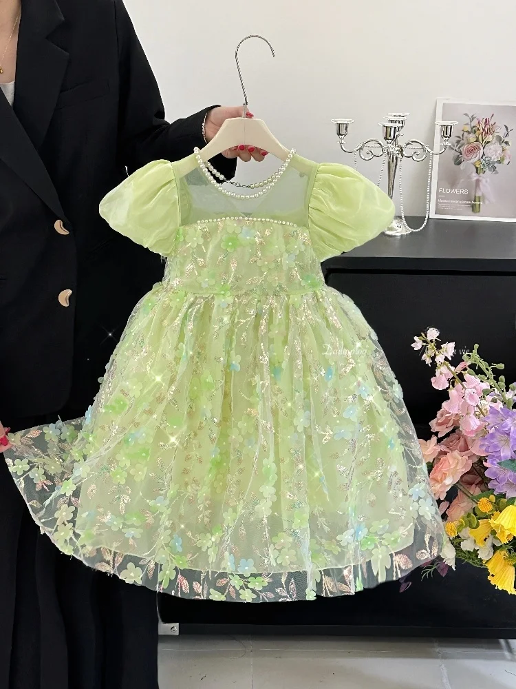 Letnia sukienka dla dziewczynek z motywem kwiatowym, bufiaste rękawki, spódniczka, moda dziecięca, wiązana.