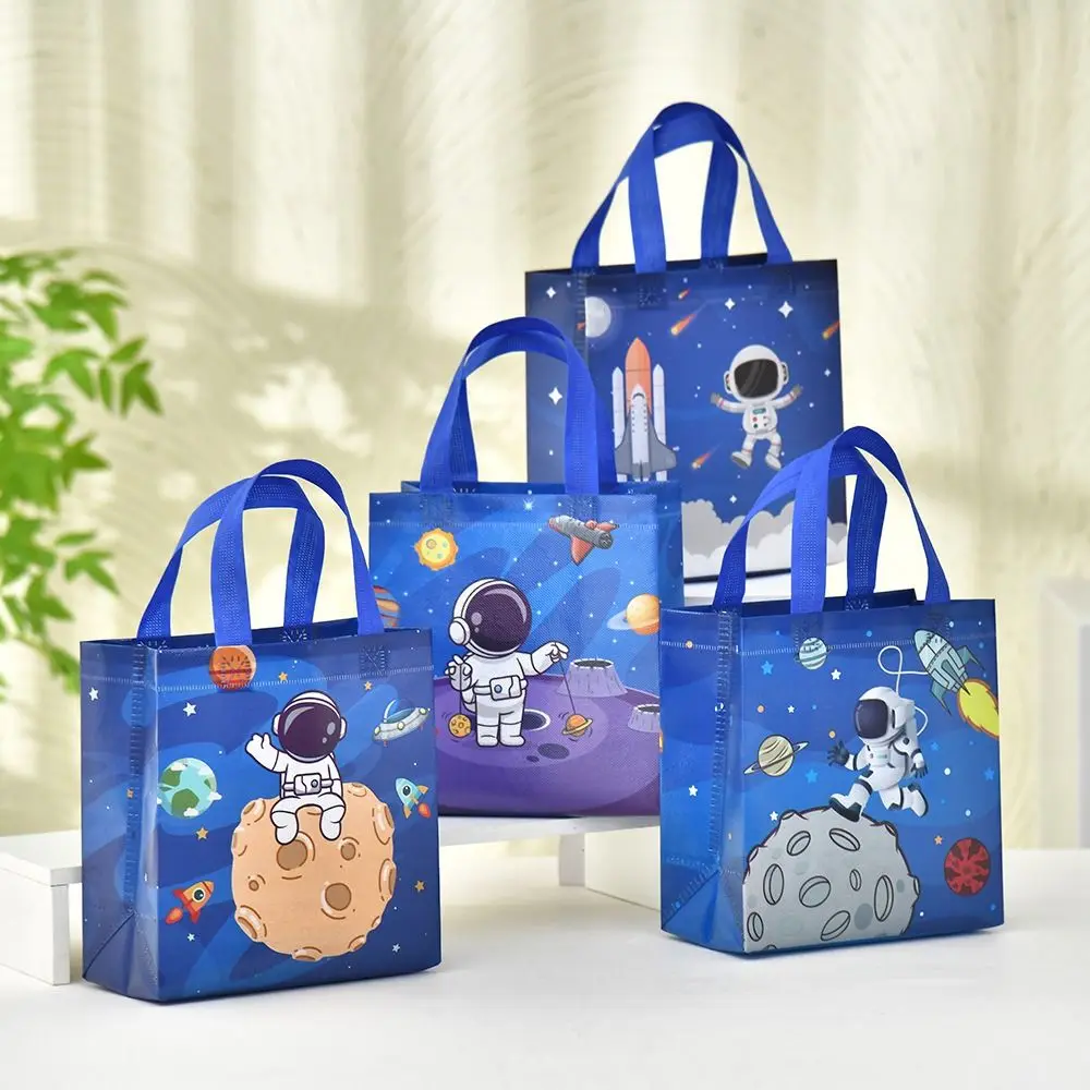 

The New Non-woven Fabric Printed Handbag Cartoon Print Astronaut Toy Storage Backpack Large Capacity Candy Gift Bag