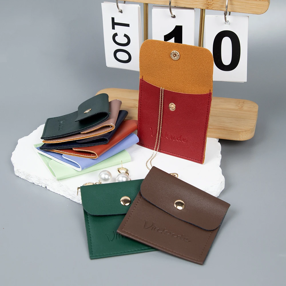 

Custom Logo 9x9cm Leather PU Jewelry Gift Bag 50pack Button Snap Pouch Packaging Earrings Necklace DIY Travel Storage Organizer