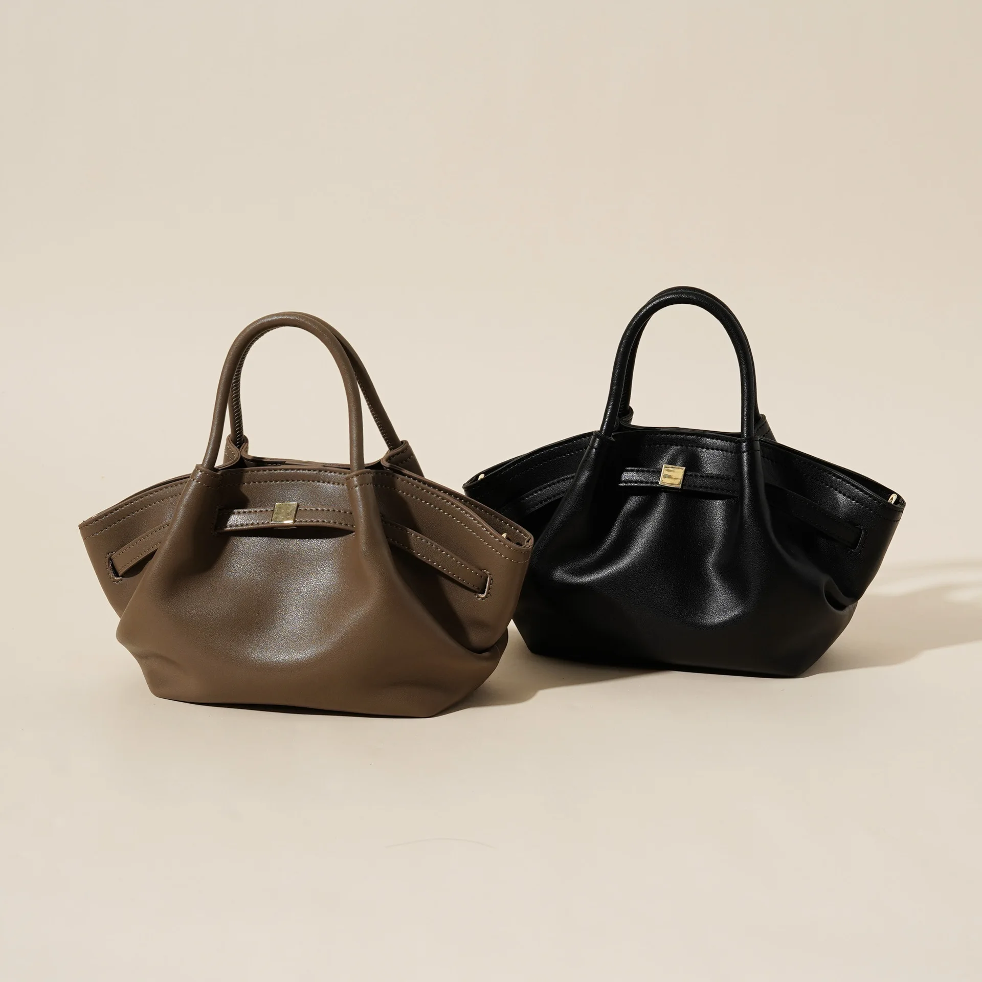 2025 New Arrival Shoulder Bag with Dumpling Shape and Leather Strap High-end Top-handle Bag with Unique Casual Design for Ladies