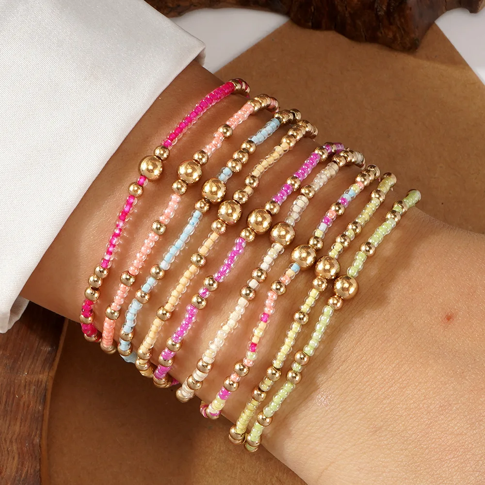 Beaded bracelet Originality Chroma Hand knitting Gold bead Bohemia Elastic force  Female Tide Simple Rice bead bracelet