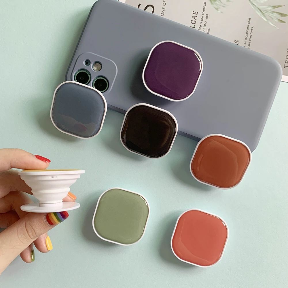 แหวนพับได้สีทึบทรงสี่เหลี่ยมที่วางโทรศัพท์ iPhone ที่วางโทรศัพท์ซ็อกเก็ตรองรับ Samsung ที่วางด้ามจับกระเป๋า