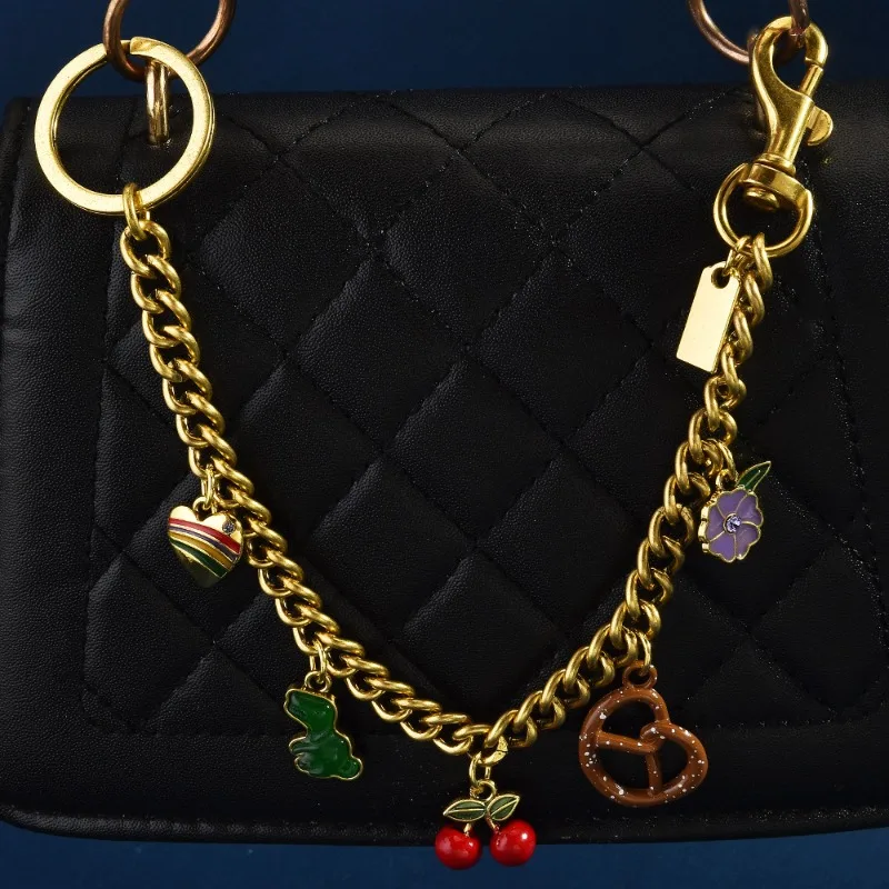 

New best-selling dinosaur heart Cherry Lotus Root Strawberry Apple bag pendant, bag pendant