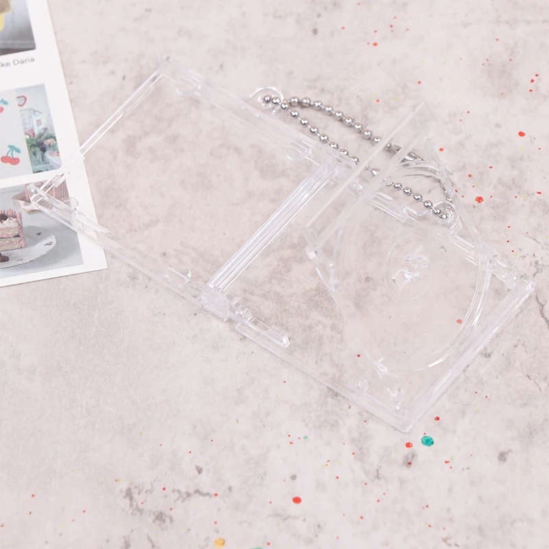 空のミニCDケースキーホルダー,DIYキーホルダー,バックパックの吊り下げ装飾,チェーンとクリップ,1個