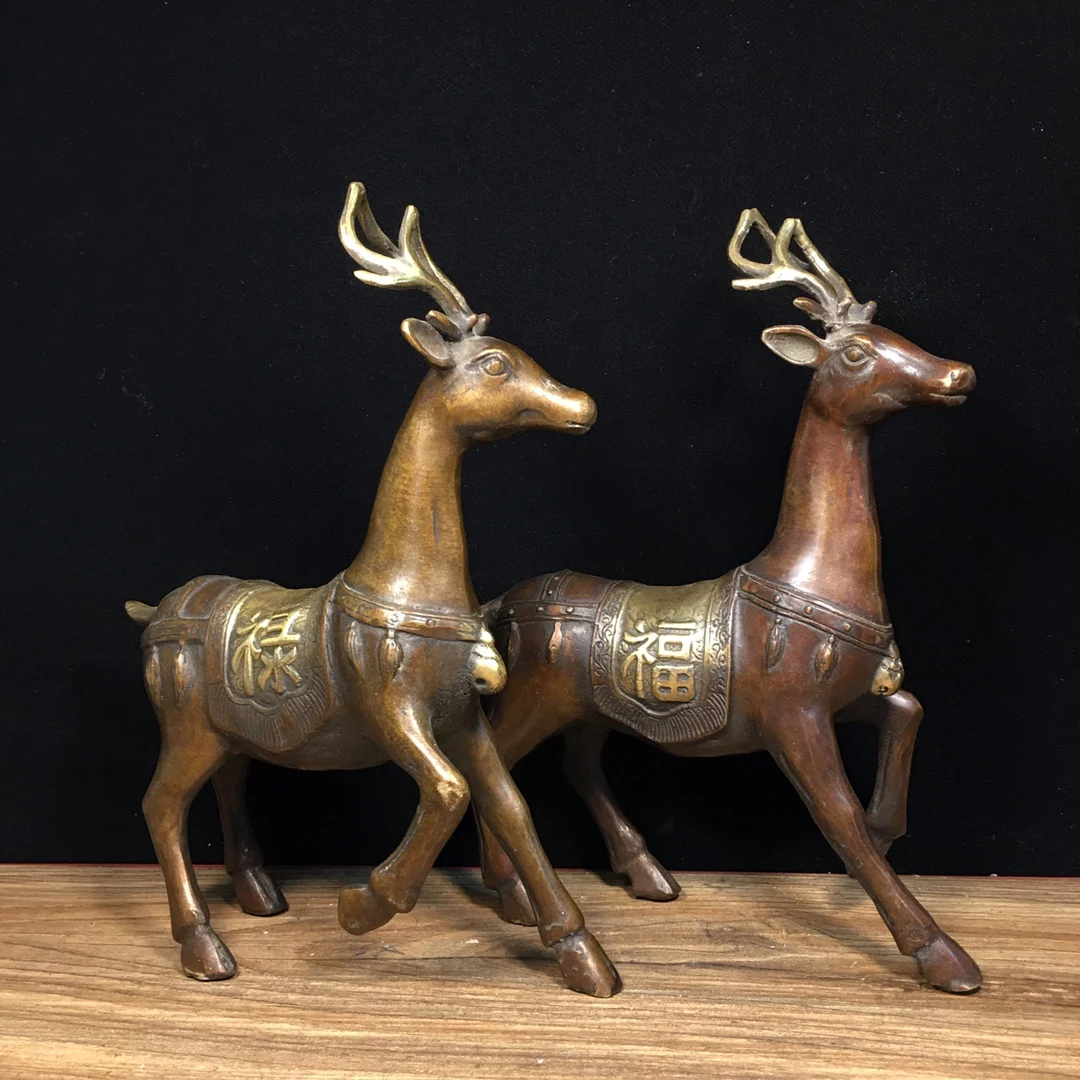 A pair of bronze statues of pure copper, gilded with gold, depicting the fortune, plum blossom, and deer Length 15.5cm, width 5c