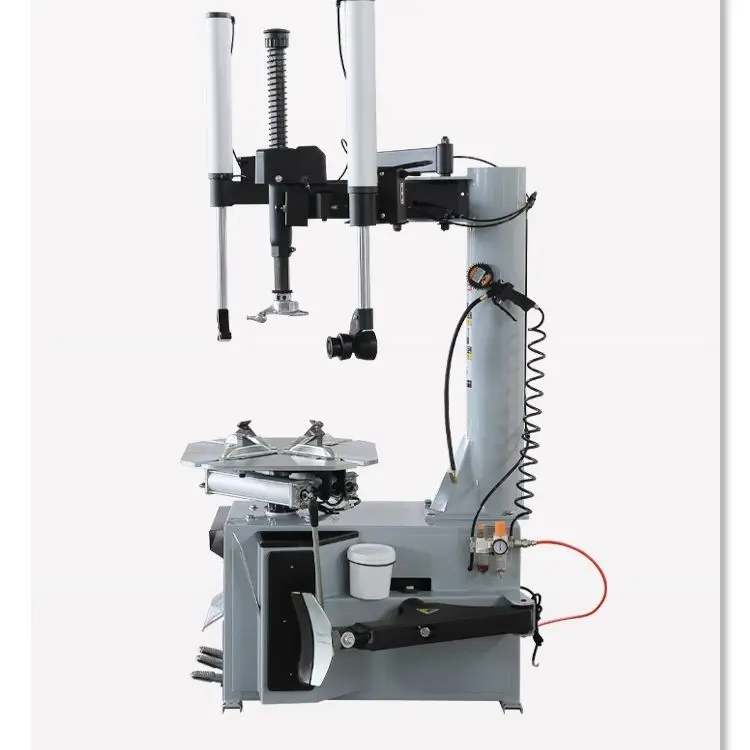 Машина для разборки и сборки автомобиля. Машина для снятия шин с двойным вспомогательным рычагом влево и вправо.