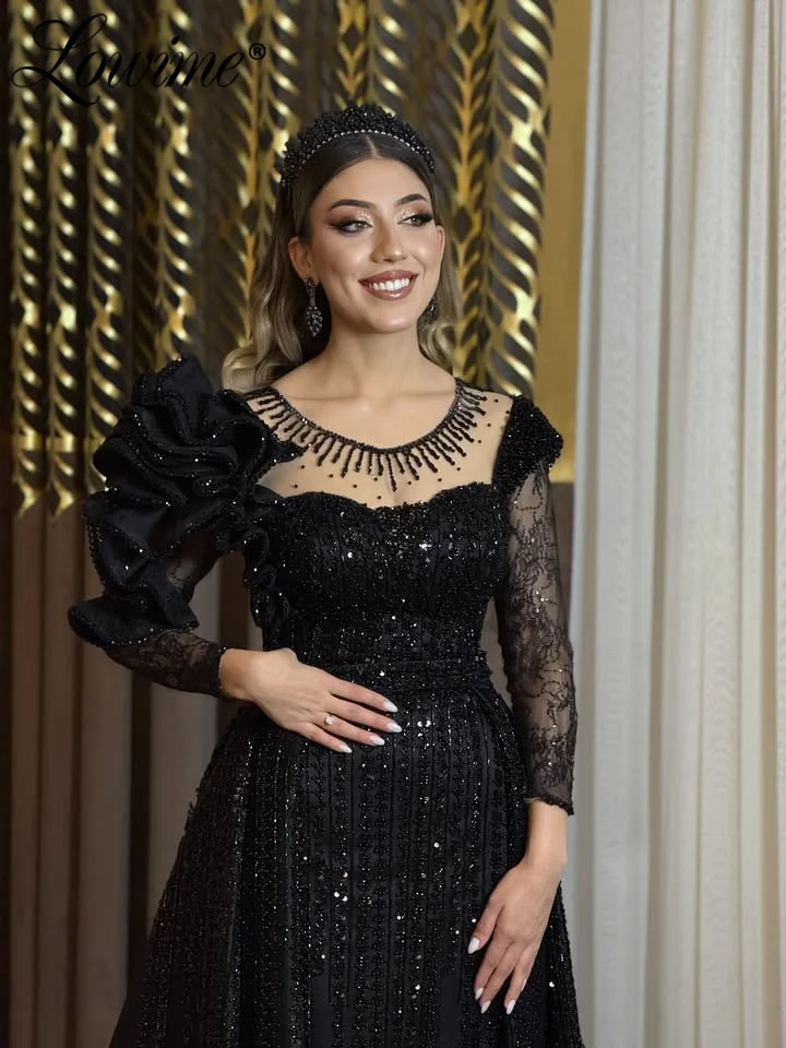 

Elegant Black Prom Dresses Ruffles Long Sleeves Mermaid Evening Gowns 2026 Dubai Arabic Beaded Celebrity Dresses With Overskirt