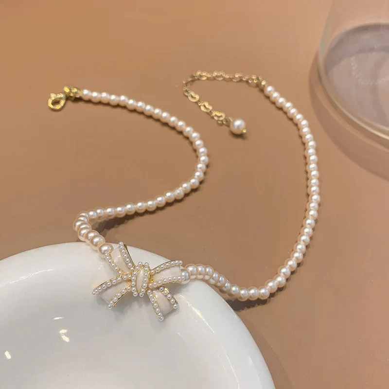 

Exquistie Pearl Bow Luxury Necklace For Women Elegant Vintage Fashion Jewelry Bowknot Lady High Quality Necklaces Choker Chain