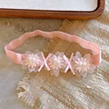 Three pink flowers