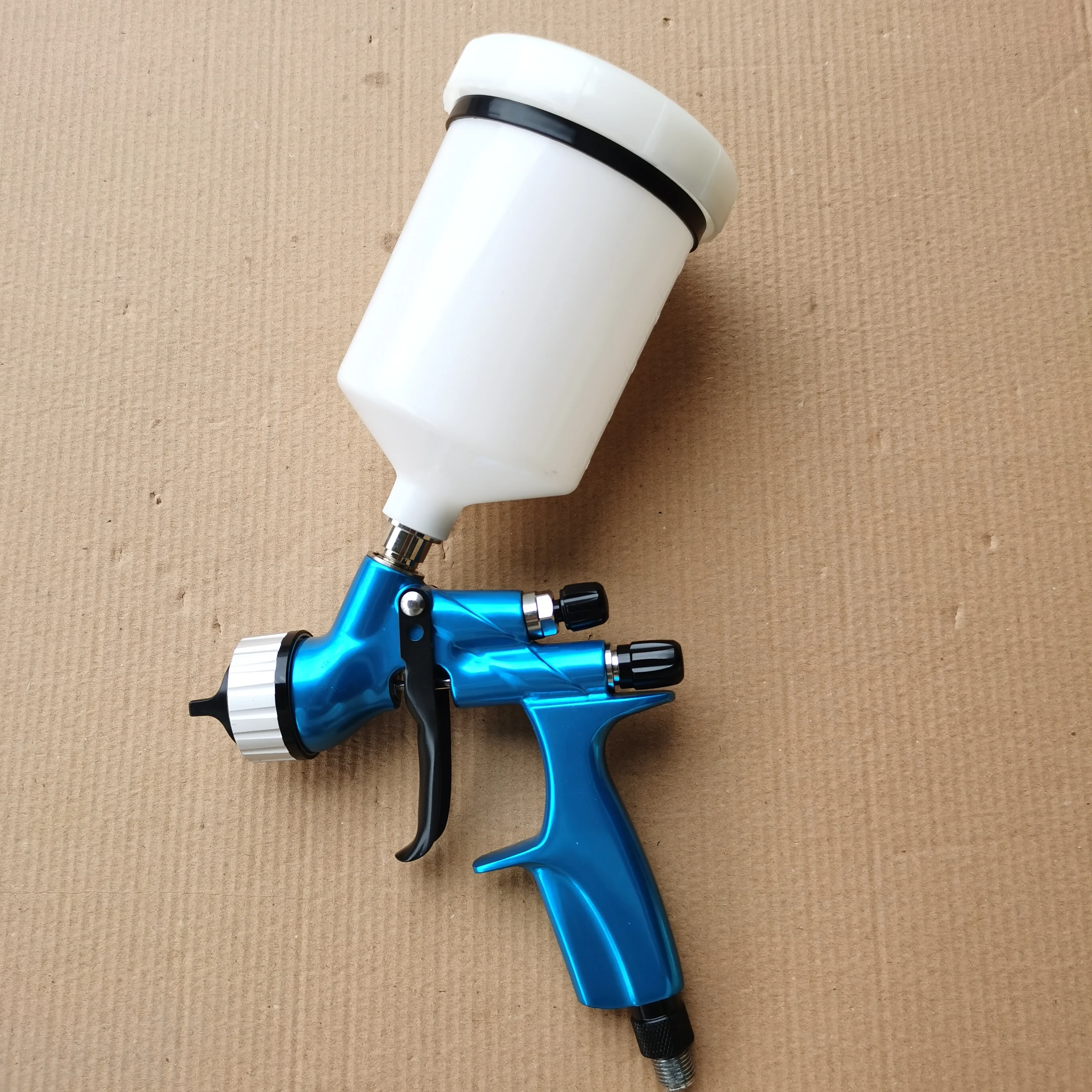 Pistola de pintura a base de agua Pistola de pulverización técnica alemana Pistola de pulverización automática