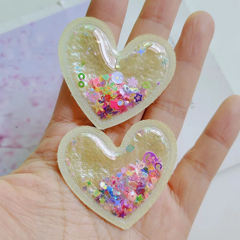 20pcs PVC Quicksand Cartoon Heart trasparente Bling Flowing patch Appliques per accessori per fascia per bambini fai da te