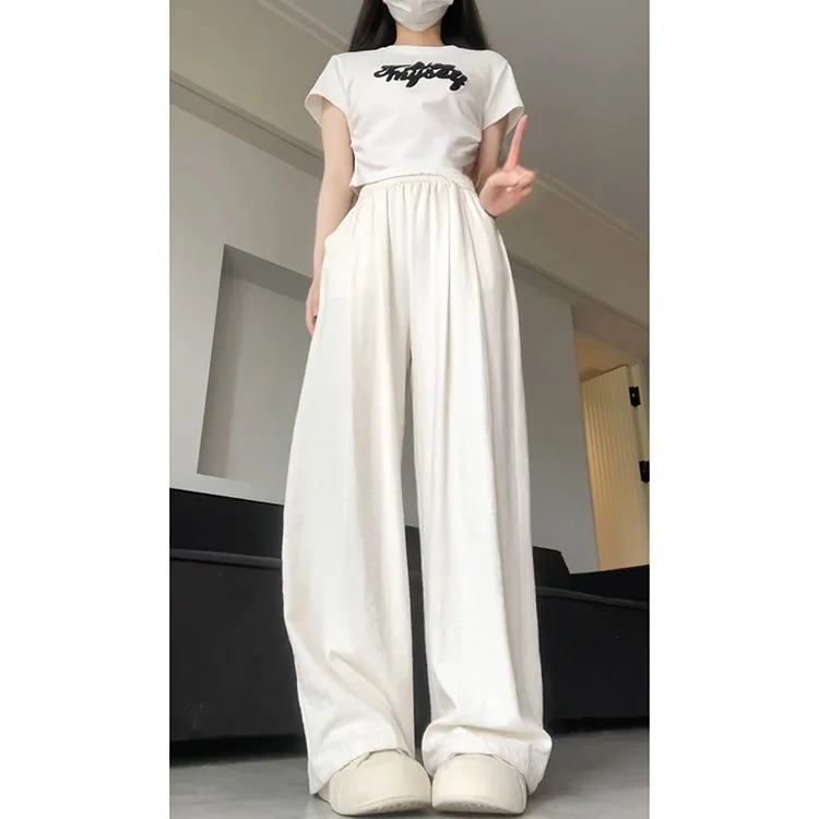 กางเกงขายาวผ้าไหมน้ำแข็งเนื้อฟองนม สไตล์ลำลอง ต่อต้านริ้วรอย สไตล์เกาหลี สำหรับผู้หญิง ฤดูใบไม้ผลิ ฤดูร้อน 2025 รุ่นใหม่ ไซส์เล็ก ระบายอากาศได้ดี ทรงขากว้าง
