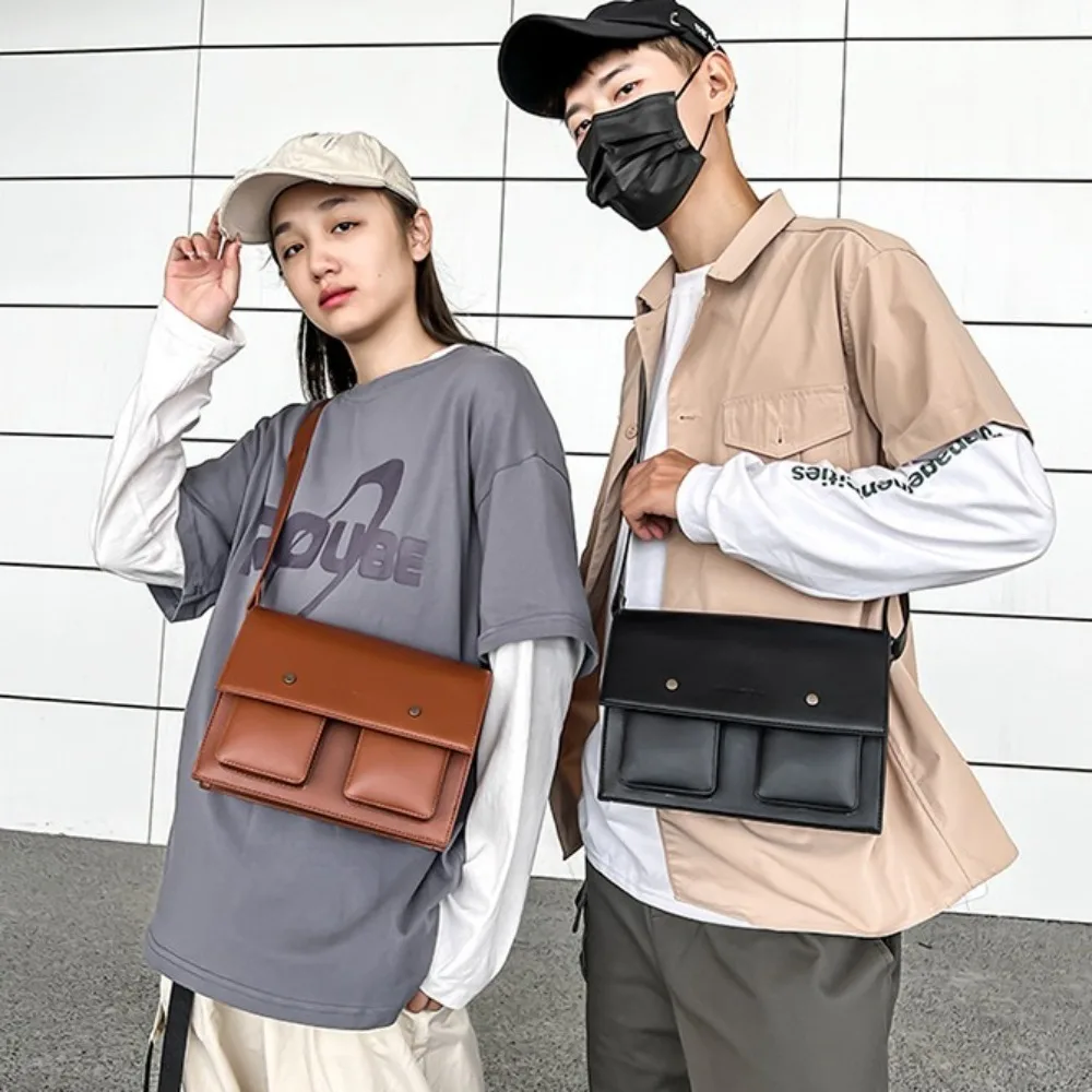 الحد الأدنى ريترو الرجال حقيبة ساعي بولي Leather الجلود Harajuku نمط Crossbody حقيبة رافعة المحمولة اليابانية حقيبة كتف مفردة زوجين