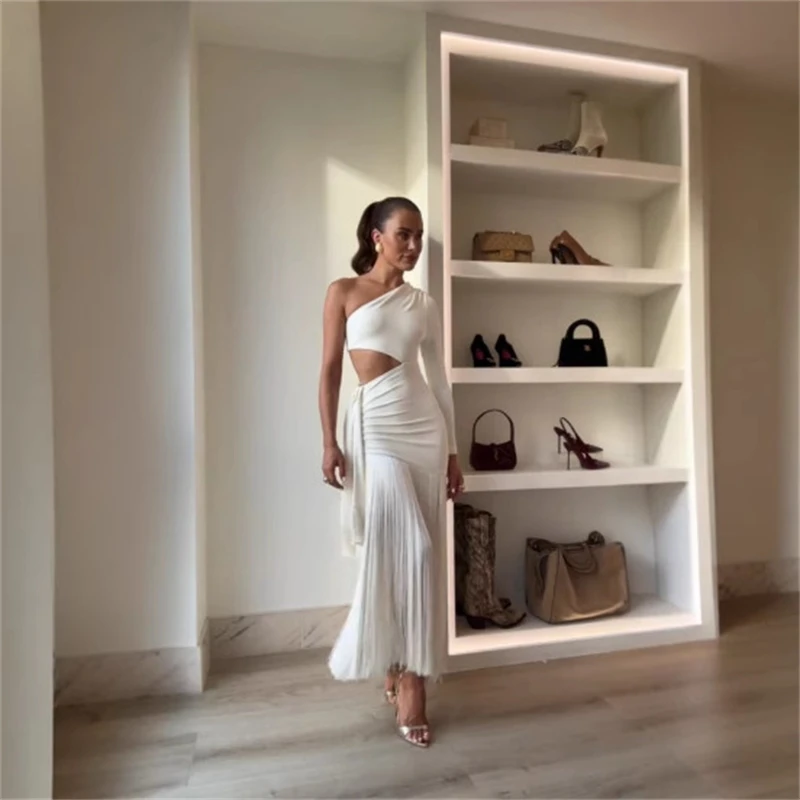 

Sexy Tassels Hallow Out Dress Women Slim Skew Collar One Long Sleeves Vestidos Female 2025 Summer Chic High Waist Dresses
