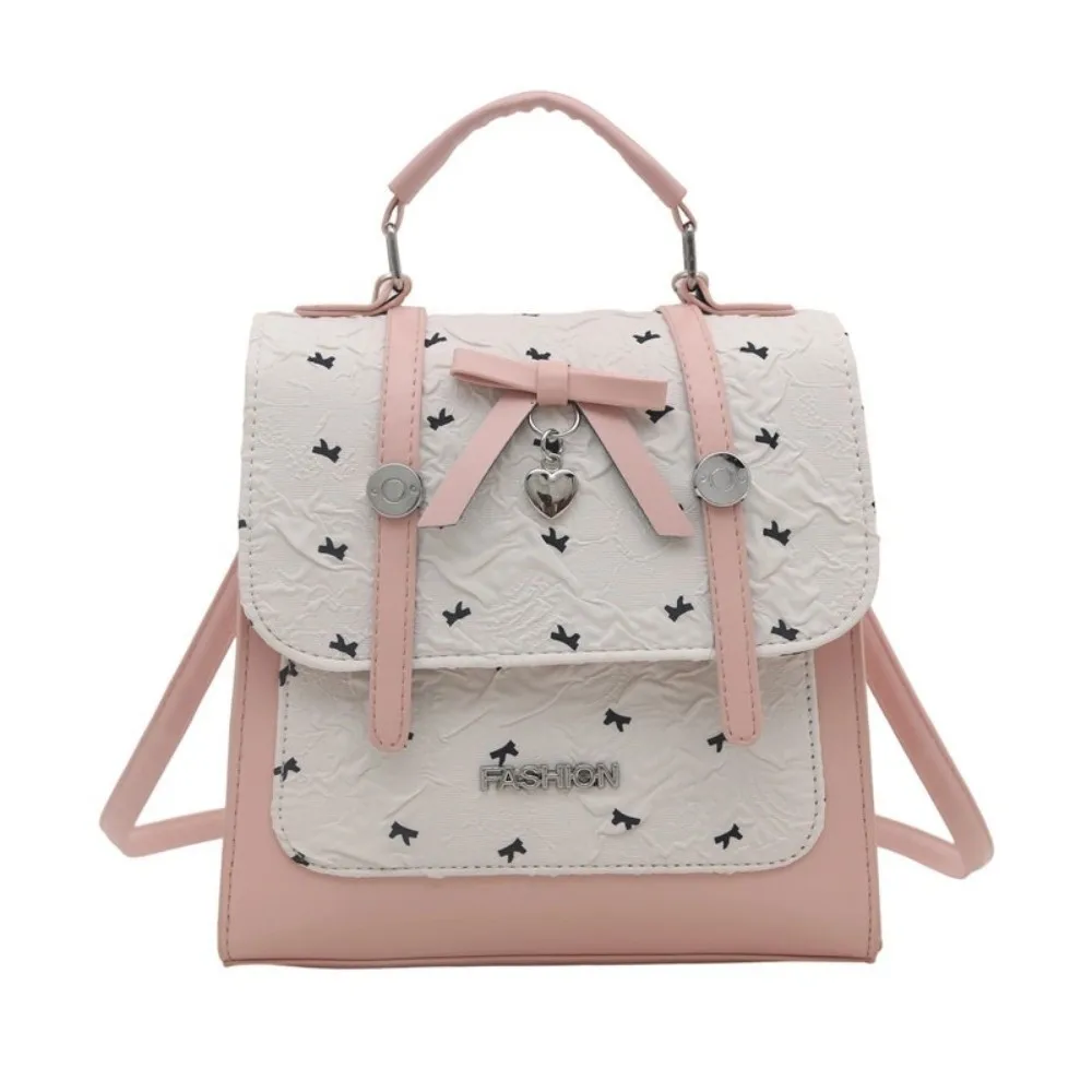 حقيبة ظهر نسائية على الطراز الياباني الجديد مصنوعة من جلد البولي يوريثان باللون الوردي والأبيض وحزام قابل للتحويل حقيبة كتف متينة مقاومة للماء للاستخدام غير الرسمي