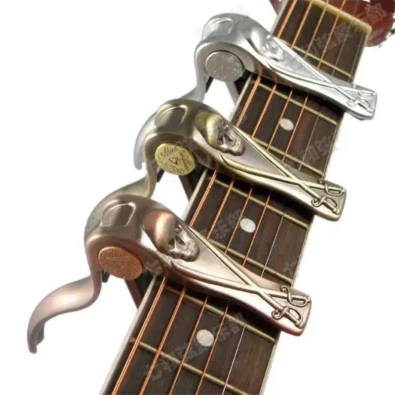 Skull style Guitar Capo Single Handed Trigger Quick Change Tuner key Clamp for Acoustic Electric Bass Guitar 3 colors