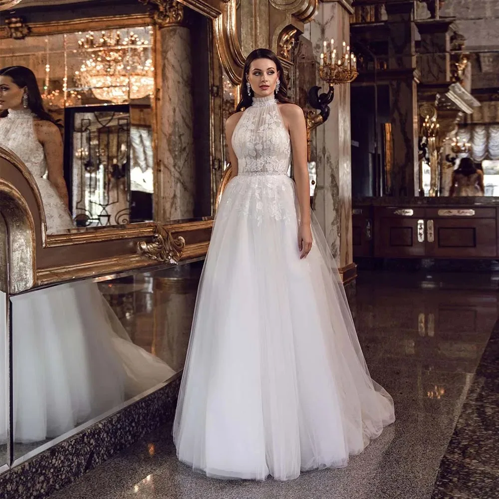 Bohemian Wedding Dresses 2025 New Lace Appliques Halter Bridal Gown Sleeveless Beaded A-Line Button Illusion Tulle Bride Dress