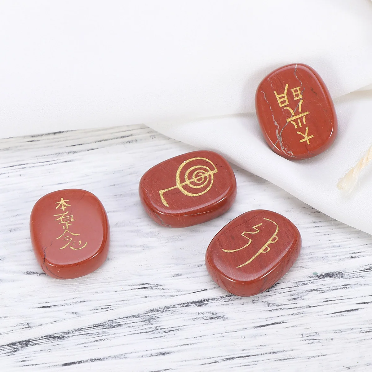 

Oval Red Engraved Chakra Symbols Palm Stone Healing Crystal Dark Red Fengshui Ritual Palm Stone Chakra Gemestone