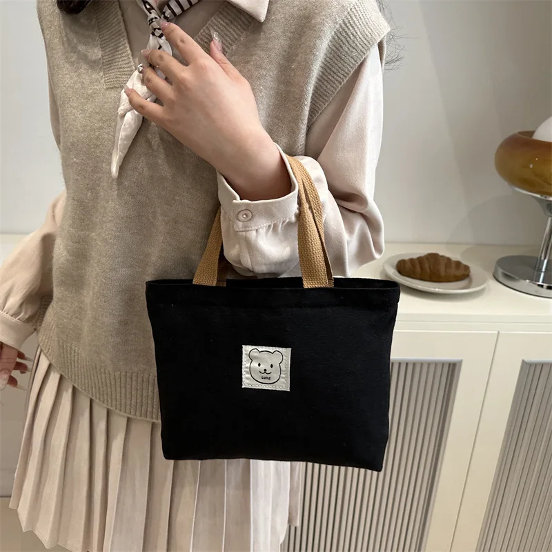 Casual Large Capacity Canvas Handbag Fashionable Student Commuter Shoulder Bag Zipper Closure Soft Polyester Lining Everyday Use