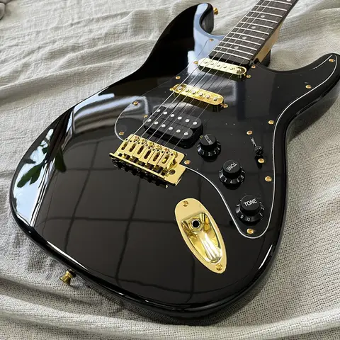 Factory-made black electric guitar with rosewood fingerboard and cherry wood body. The perfect gift for Christmas. Free shipping