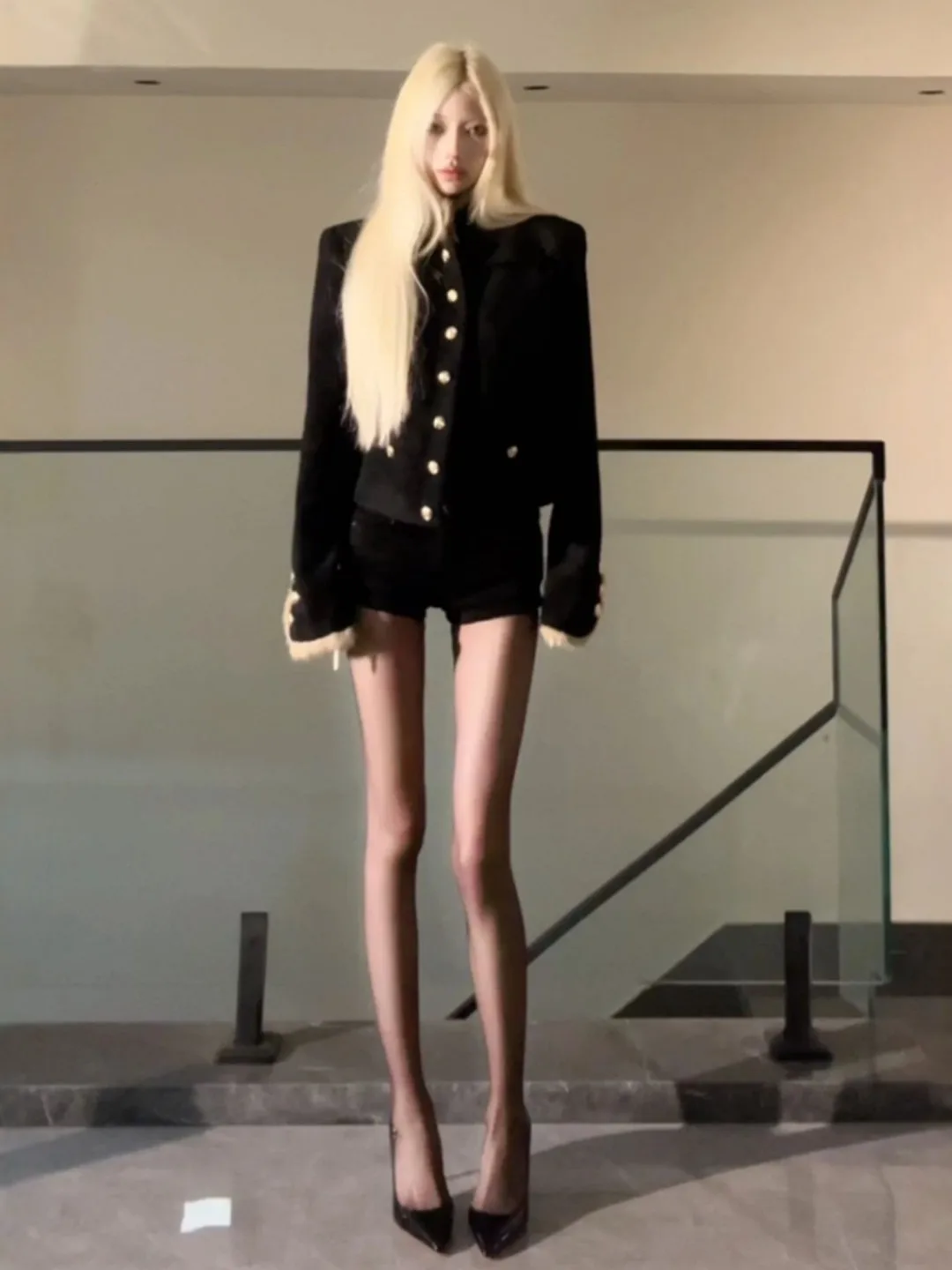 

Korean Sle ort Bla Jaet Ele Sensation Spring 2026 Faion Trend Button Detail Warmth Stand Fit Ladies Coat