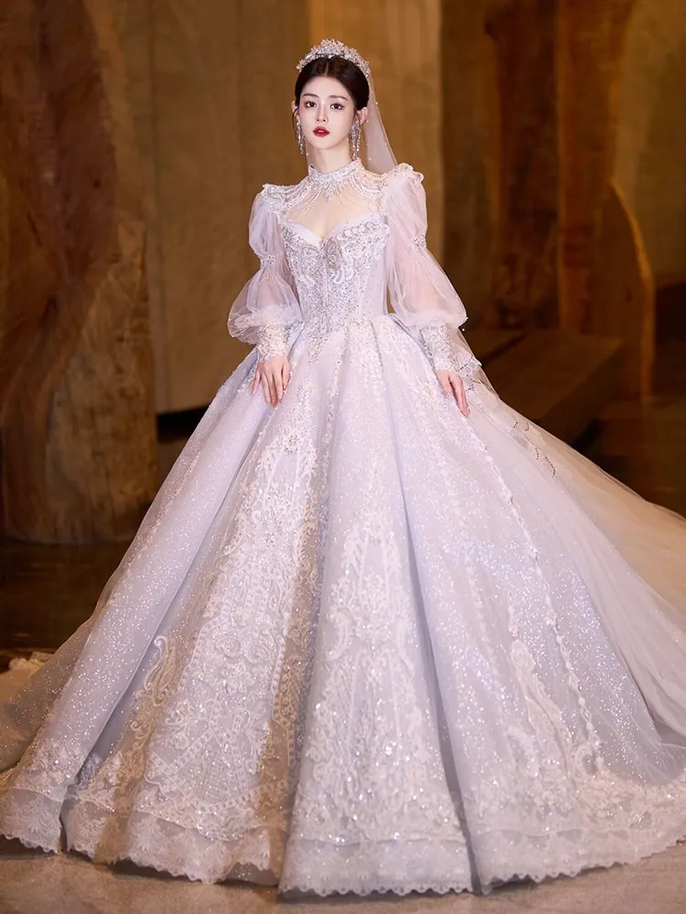 

A new blue light main fabric heavy industry long-sleeved plate-size tailline dress