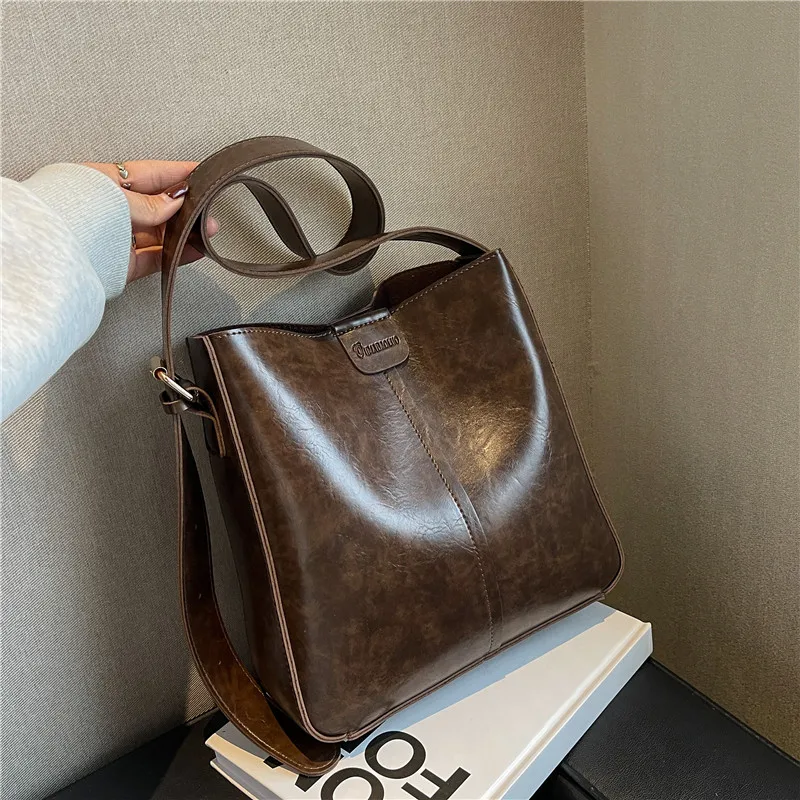 Sac à main en cuir PU pour femme, grande capacité, sac à bandoulière portable, sac à main à une seule initiative, tendance féminine, E27