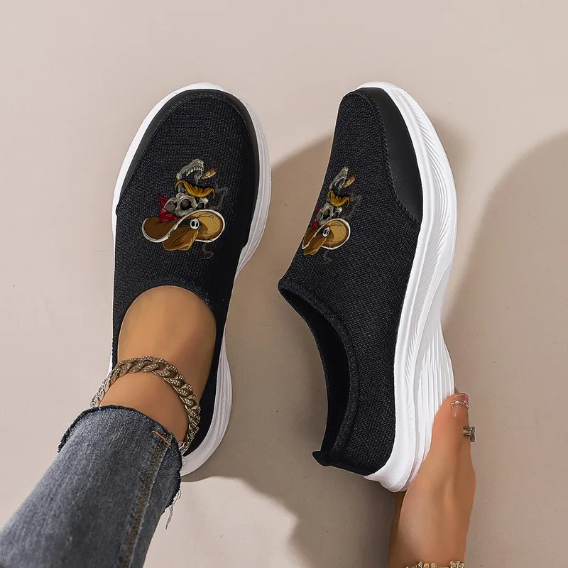 

Women's Black Cartoon Embroidered Slip-On Sneakers: Thick Sole for Daily Commute & Casual Wear. Comfortable & Lightweight.
